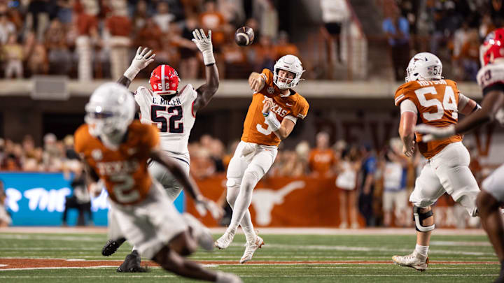 Oct 19, 2024; Austin, Texas, USA; Texas Longhorns quarterback Quinn Ewers (3) throws the ball in the fourth quarter against the Georgia Bulldogs at Darrell K Royal-Texas Memorial Stadium. Mandatory Credit: Brett Patzke-Imagn Images