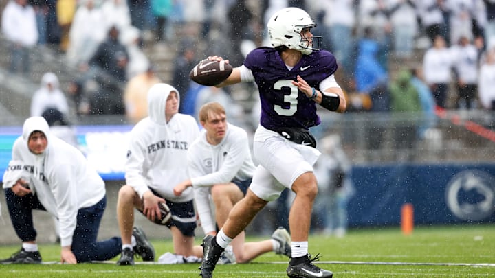 Penn State Nittany Lions quarterback Rocco Becht looks to throw a pass on the run during the Blue-White Spring Practice at Beaver Stadium. 