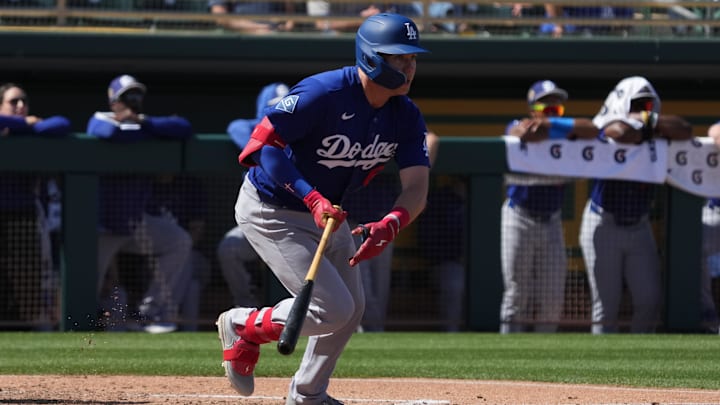 Mar 8, 2026; Mesa, Arizona, USA; Los Angeles Dodgers left fielder Ryan Ward (67) hits an RBI double against the Athletics in the second inning at Hohokam Stadium. Mandatory Credit: Rick Scuteri-Imagn Images