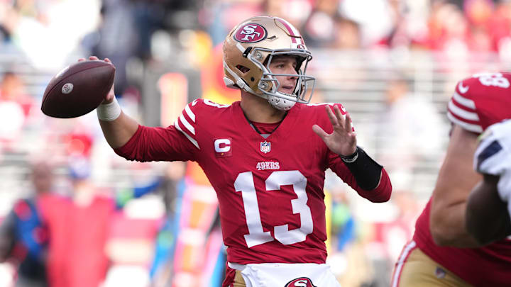 Dec 10, 2023; Santa Clara, California, USA; San Francisco 49ers quarterback Brock Purdy (13) throws a pass against the Seattle Seahawks during the second quarter at Levi's Stadium. Mandatory Credit: Darren Yamashita-Imagn Images Dec 10, 2023; Santa Clara, California, USA; San Francisco 49ers quarterback Brock Purdy (13) throws a pass against the Seattle Seahawks during the second quarter at Levi's Stadium. Mandatory Credit: Darren Yamashita-Imagn Images