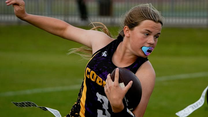 Fort Pierce Central’s Kailee Grone (3) runs the ball against Centennial during a girls flag football game, Tuesday, March 4, 2025, at Fort Pierce Central High School. Fort Pierce Central’s Kailee Grone (3) runs the ball against Centennial during a girls flag football game, Tuesday, March 4, 2025, at Fort Pierce Central High School.