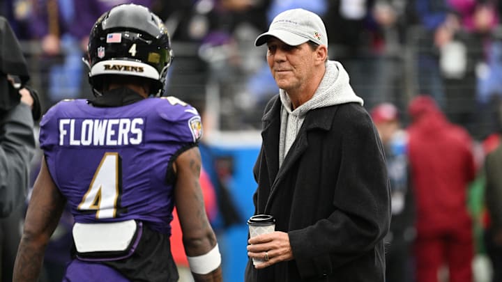 Jan 28, 2024; Baltimore, Maryland, USA; Baltimore Ravens owner Steve Bisciotti (right) talks with Baltimore Ravens wide receiver Zay Flowers (4) prior to the AFC Championship football game against the Kansas City Chiefs at M&T Bank Stadium. Mandatory Credit: Tommy Gilligan-Imagn Images