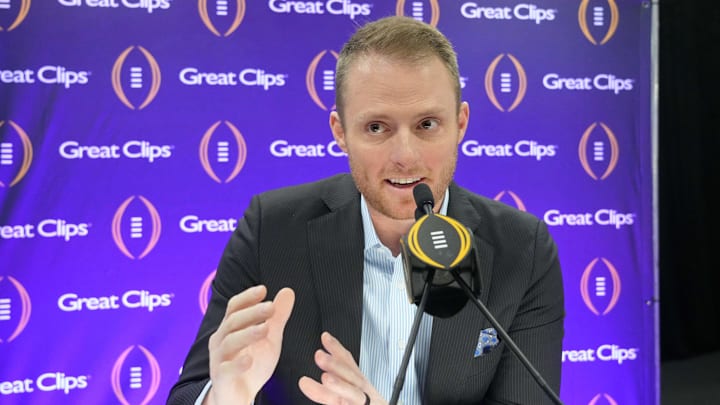 ESPN analyst Greg McElroy talks to the media.