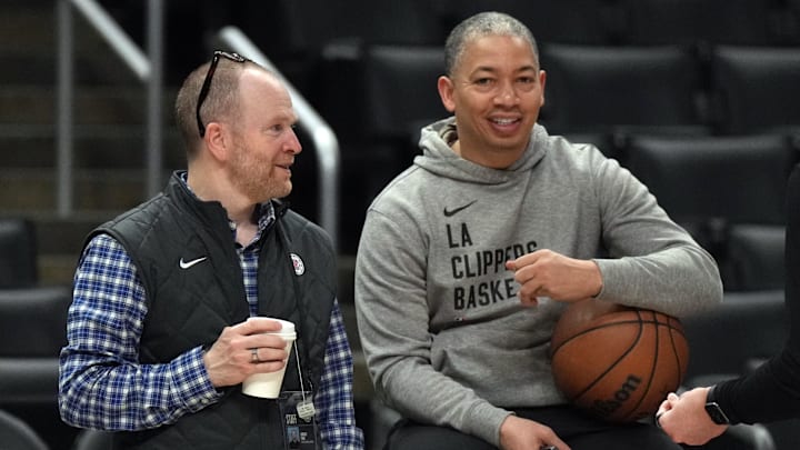 Feb 25, 2024; Los Angeles, California, USA; LA Clippers president of basketball operations Lawrence Frank (left) talks with coach Tyronn Lue before the game against the Sacramento Kings at Crypto.com Arena. Mandatory Credit: Kirby Lee-Imagn Images