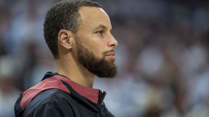 May 8, 2025; Minneapolis, Minnesota, USA; Golden State Warriors guard Stephen Curry (30) looks on from the bench against the Minnesota Timberwolves in the second half during game two of the second round for the 2025 NBA Playoffs at Target Center. May 8, 2025; Minneapolis, Minnesota, USA; Golden State Warriors guard Stephen Curry (30) looks on from the bench against the Minnesota Timberwolves in the second half during game two of the second round for the 2025 NBA Playoffs at Target Center.
