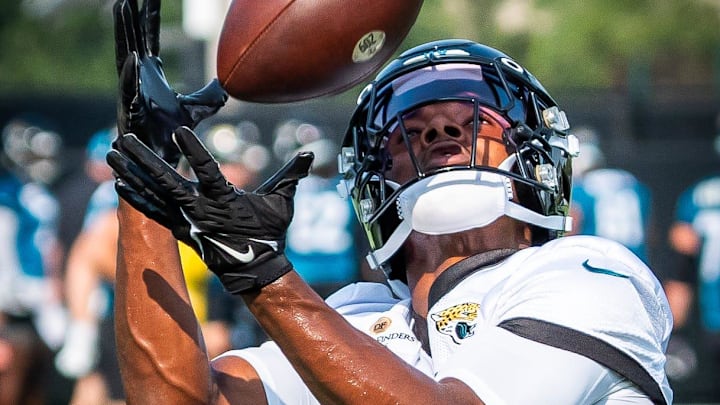 Jacksonville Jaguars cornerback Caleb Ransaw (27) hauls in a pass while running routes during the seventh organized team activity at the Miller Electric Center in Jacksonville, Fla. Monday, June 2, 2025. 