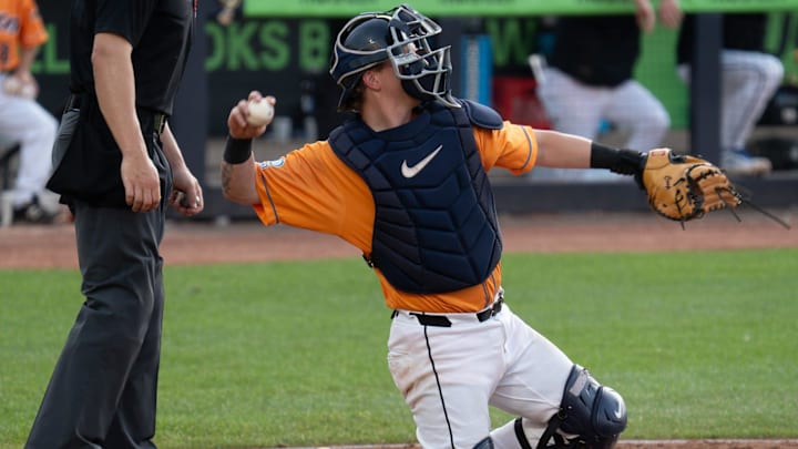 RubberDucks catcher Cooper Ingle throws the ball back to the pitcher July 9, 2025, in Akron, Ohio.