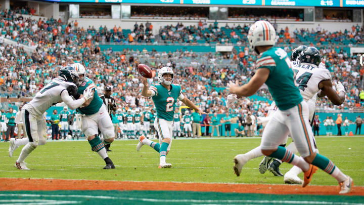 Miami Dolphins holder Matt Haack (2) throws a touchdown pass to kicker Jason Sanders (7) on a fake field goal attempt in the second quarter against the Philadelphia Eagles in 2019.