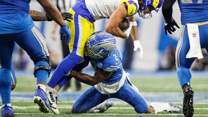 Detroit Lions safety C.J. Gardner-Johnson (2) tackles L.A. Rams wide receiver Puka Nacua (17) during