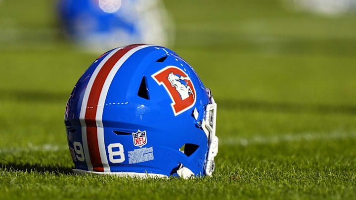 Jan 5, 2025; Denver, Colorado, USA; General view of the helmet worn by Denver Broncos defensive end John Franklin-Myers (98) (not pictured) before the game against the Kansas City Chiefs at Empower Field at Mile High. Mandatory Credit: Ron Chenoy-Imagn Images
