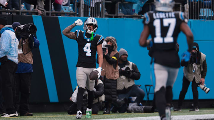 Nov 30, 2025; Charlotte, North Carolina, USA; Carolina Panthers wide receiver Tetairoa McMillan (4) celebrates after scoring a touchdown during the fourth quarter against the Los Angeles Rams at Bank of America Stadium. Nov 30, 2025; Charlotte, North Carolina, USA; Carolina Panthers wide receiver Tetairoa McMillan (4) celebrates after scoring a touchdown during the fourth quarter against the Los Angeles Rams at Bank of America Stadium.