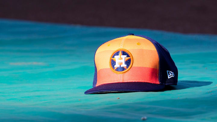 Apr 9, 2024; Kansas City, Missouri, USA; A general view of Houston Astros second base Jose Altuve (27) hat on the field during batting practice prior to a game against the Kansas City Royals at Kauffman Stadium. Mandatory Credit: Denny Medley-Imagn Images
