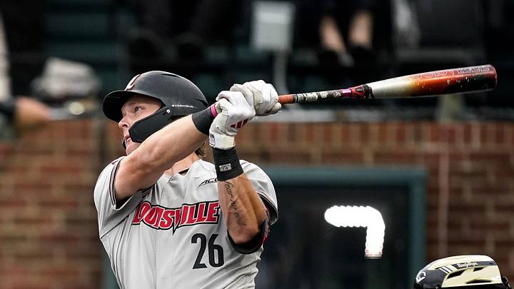 Louisville catcher Jimmy Nugent (26) hits a grand slam home run against Vanderbilt during the first inning at Hawkins Field in Nashville, Tenn., Tuesday, May 5, 2026.