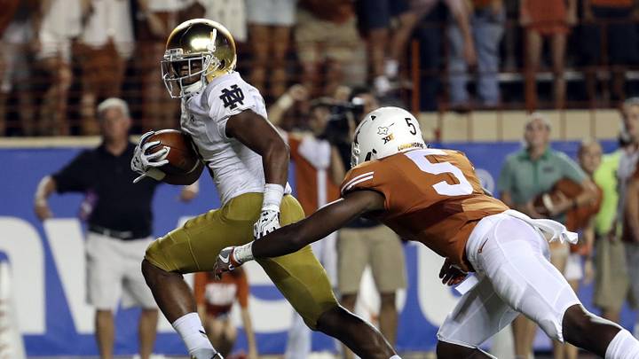 Notre Dame Fighting Irish wide receiver C.J. Sanders scores a touchdown in overtime past Texas Longhorns defensive back Holton Hill (5) at Darrell K Royal-Texas Memorial Stadium. Notre Dame Fighting Irish wide receiver C.J. Sanders scores a touchdown in overtime past Texas Longhorns defensive back Holton Hill (5) at Darrell K Royal-Texas Memorial Stadium.