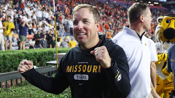 Oct 18, 2025; Auburn, Alabama, USA;  Missouri Tigers head coach Eli Drinkwitz celebrates after his team beat the Auburn Tigers in overtime at Jordan-Hare Stadium. Mandatory Credit: John Reed-Imagn Images
