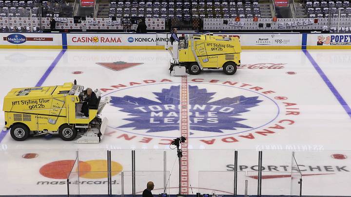 Oct 7, 2017; Toronto, Ontario, CAN; A general view of the logo at center ice as the zambonis clear the ice before the Toronto Maple Leafs home opener against the New York Rangers at Air Canada Centre. Mandatory Credit: Tom Szczerbowski-USA TODAY Sports