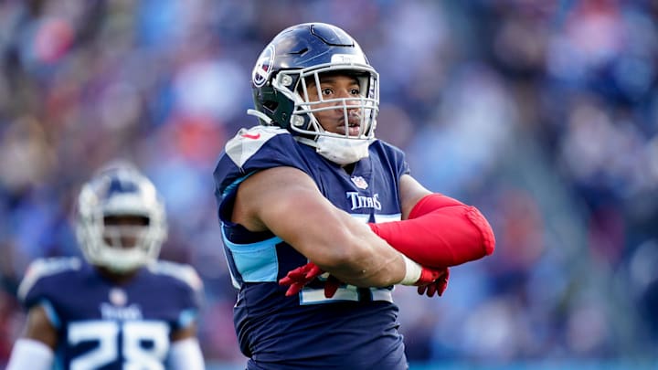 Nov 13, 2022; Nashville, Tennessee, USA; Tennessee Titans defensive end DeMarcus Walker (95) strikes a pose after getting a sack during the fourth quarter at Nissan Stadium. Mandatory Credit: George Walker IV-Imagn Images