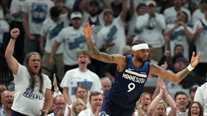 May 26, 2025; Minneapolis, Minnesota, USA; Minnesota Timberwolves guard Nickeil Alexander-Walker (9) reacts against the Oklahoma City Thunder in the first half during game four of the western conference finals for the 2025 NBA Playoffs at Target Center.