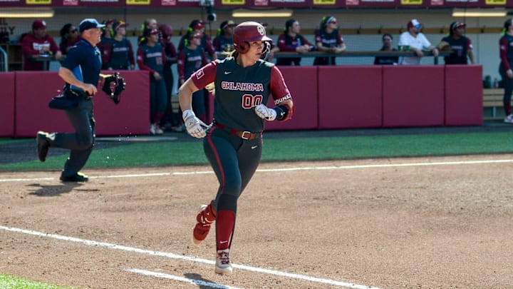 Oklahoma infielder/outfielder/pitcher Allyssa Parker prepares to round first base after hitting a home run against Sam Houston. Oklahoma infielder/outfielder/pitcher Allyssa Parker prepares to round first base after hitting a home run against Sam Houston.