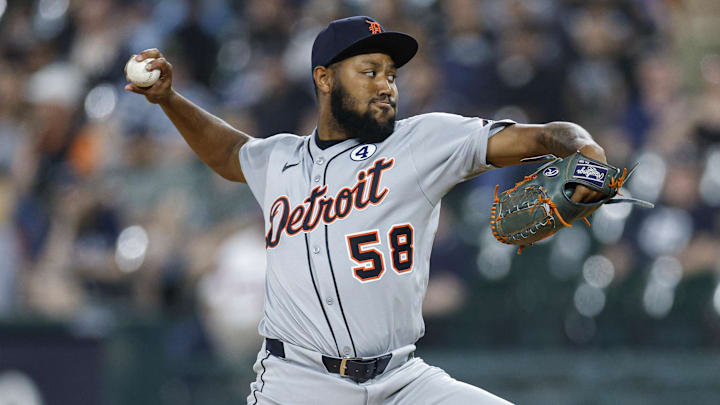 Jun 2, 2025; Chicago, Illinois, USA; Detroit Tigers relief pitcher Dylan Smith (58) delivers a pitch against the Chicago White Sox during the seventh inning at Rate Field. Mandatory Credit: Kamil Krzaczynski-Imagn Images
