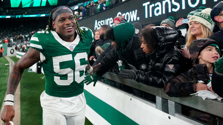 New York Jets linebacker Quincy Williams (56) gives high-fives to fans after Gang Green who their final game of the season, 32-20, Sunday January 5, 2025, in East Rutherford. New York Jets linebacker Quincy Williams (56) gives high-fives to fans after Gang Green who their final game of the season, 32-20, Sunday January 5, 2025, in East Rutherford.