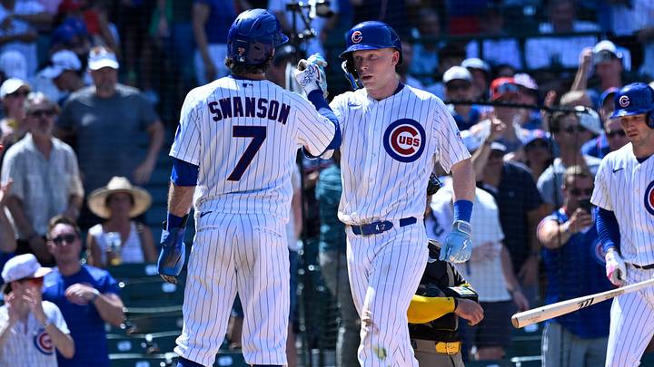 Jul 1, 2026; Chicago, Illinois, USA; Chicago Cubs center fielder Pete Crow-Armstrong (4) high fives shortstop Dansby Swanson (7) after they score on his three run home run during the fifth inning against then San Diego Padres at Wrigley Field. Mandatory Credit: Matt Marton-Imagn Images Jul 1, 2026; Chicago, Illinois, USA; Chicago Cubs center fielder Pete Crow-Armstrong (4) high fives shortstop Dansby Swanson (7) after they score on his three run home run during the fifth inning against then San Diego Padres at Wrigley Field. Mandatory Credit: Matt Marton-Imagn Images