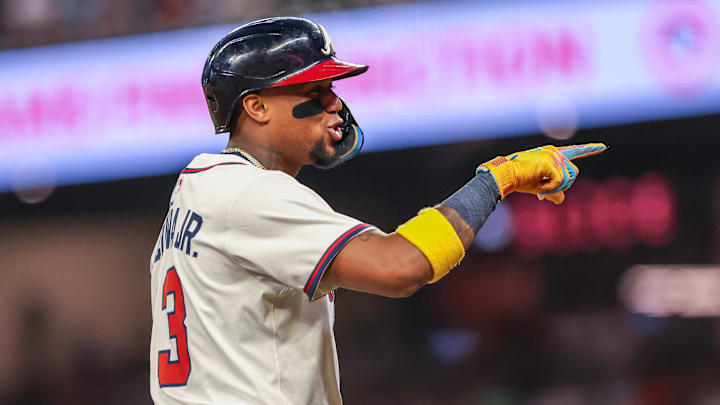 Atlanta Braves outfielder Ronald Acuna Jr. (13) talks to the visitor dugout during the game against the Chicago Cubs during the third inning at Truist Park. 