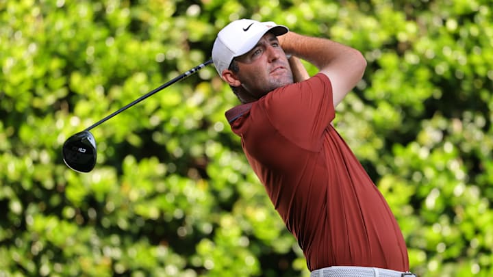 Scottie Scheffler tees off during the opening round of the 2025 PGA Championship at Quail Hollow Club
