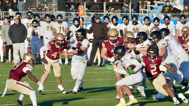 St. Anthony's Xavier Bala runs the ball against Iona Prep in the CHSFL AAA championship game at Mitchel Athletic Complex in Uniondale on Nov. 23, 2024.