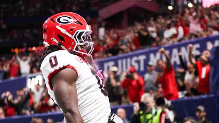 Dec 6, 2025; Atlanta, GA, USA; Georgia Bulldogs running back Roderick Robinson II (0) celebrates after scoring a touchdown during the first quarter against the Alabama Crimson Tide during the 2025 SEC Championship game at Mercedes-Benz Stadium. Mandatory Credit: Brett Davis-Imagn Images