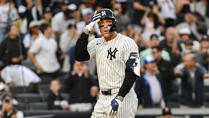 Jun 8, 2025; Bronx, New York, USA; New York Yankees outfielder Aaron Judge (99) reacts after hitting a two-run home run against the Boston red Sox during the first inning at Yankee Stadium. Mandatory Credit: John Jones-Imagn Images