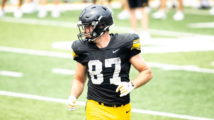 Aug 9, 2025; Iowa tight end Addison Ostrenga (87) lines up during the Hawkeyes Kids Day NCAA football open practice at Kinnick Stadium in Iowa City, Iowa. Mandatory Credit: Joseph Cress for the Des Moines Register