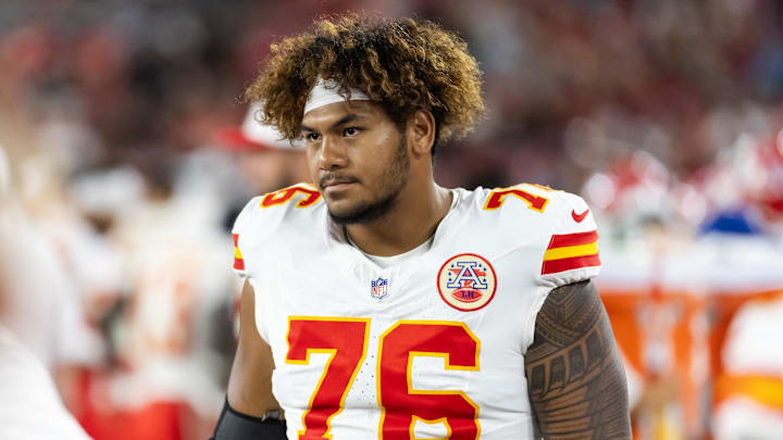 Aug 9, 2025; Glendale, Arizona, USA; Kansas City Chiefs offensive tackle Kingsley Suamataia (76) against the Arizona Cardinals during a preseason NFL game at State Farm Stadium. Mandatory Credit: Mark J. Rebilas-Imagn Images