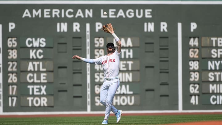 Aug 17, 2025; Boston, Massachusetts, USA; Boston Red Sox shortstop Trevor Story (10) makes a catch for an out during the first inning against the Miami Marlins at Fenway Park. Mandatory Credit: Bob DeChiara-Imagn Images