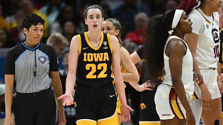 Apr 7, 2024; Cleveland, OH, USA; Iowa Hawkeyes guard Caitlin Clark (22) reacts tot he referee against the South Carolina Gamecocks in the finals of the Final Four of the womens 2024 NCAA Tournament  at Rocket Mortgage FieldHouse. Mandatory Credit: Ken Blaze-Imagn Images