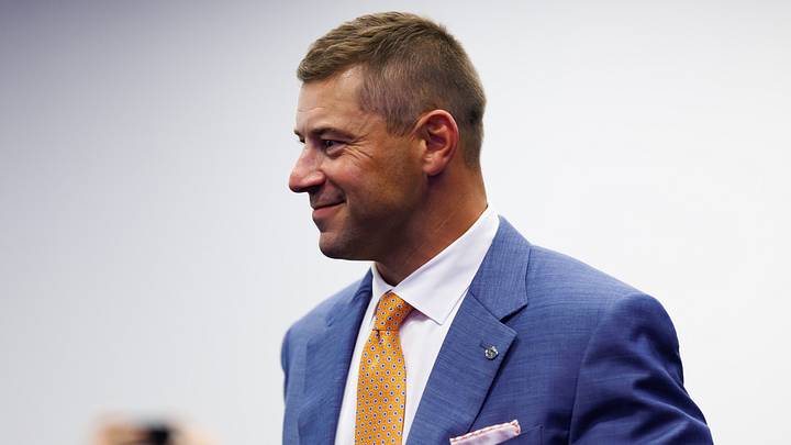 Dec 1, 2025; Gainesville, FL, USA; Florida Gators head coach Jon Sumrall walks into the room before the press conference at the Heavener Football Training Center at the University of Florida. Mandatory Credit: Matt Pendleton-Imagn Images Dec 1, 2025; Gainesville, FL, USA; Florida Gators head coach Jon Sumrall walks into the room before the press conference at the Heavener Football Training Center at the University of Florida. Mandatory Credit: Matt Pendleton-Imagn Images