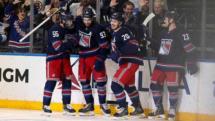 Nov 3, 2024; New York, New York, USA; New York Rangers left wing Chris Kreider (20) celebrates his short-handed goal against the New York Islanders with defenseman Ryan Lindgren (55), center Mika Zibanejad (93) and defenseman Adam Fox (23) during the first period at Madison Square Garden. Mandatory Credit: Danny Wild-Imagn Images