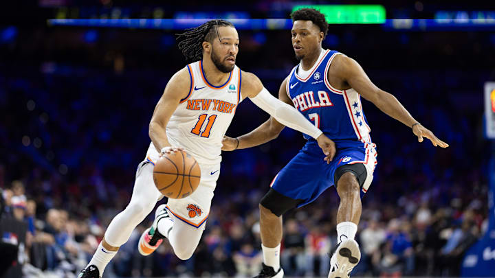 Apr 25, 2024; Philadelphia, Pennsylvania, USA; New York Knicks guard Jalen Brunson (11) dribbles the ball against Philadelphia 76ers guard Kyle Lowry (7) during the second quarter of game three of the first round for the 2024 NBA playoffs at Wells Fargo Center. Mandatory Credit: Bill Streicher-USA TODAY Sports