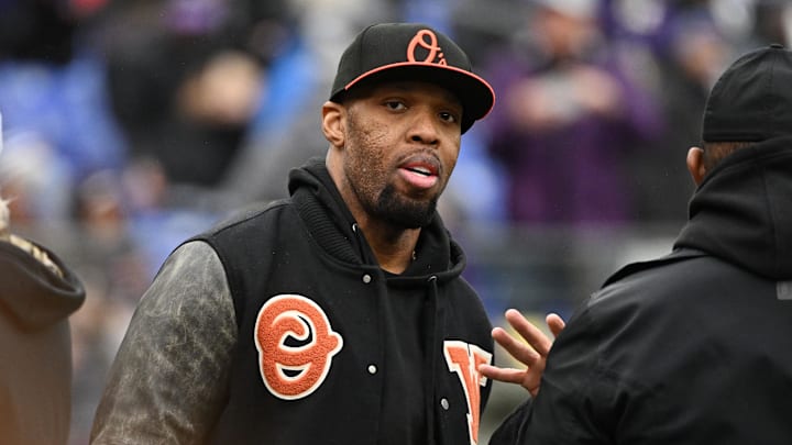 Former Baltimore Ravens linebacker Terrell Suggs looks on from the field prior to the AFC Championship football game against the Kansas City Chiefs. Former Baltimore Ravens linebacker Terrell Suggs looks on from the field prior to the AFC Championship football game against the Kansas City Chiefs.