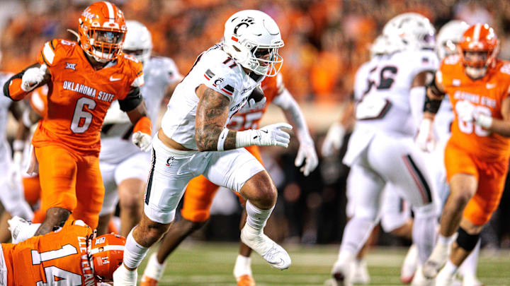 Oct 18, 2025; Stillwater, Oklahoma, USA; Cincinnati Bearcats tight end Joe Royer (11) runs the ball during the second half against the Oklahoma State Cowboys at Boone Pickens Stadium. Mandatory Credit: William Purnell-Imagn Images
