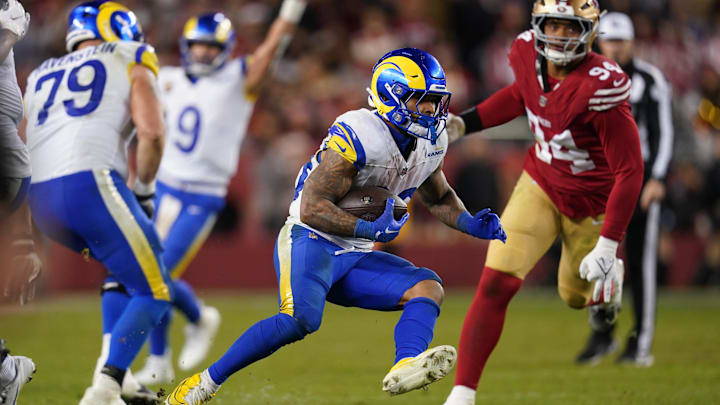 Los Angeles Rams running back Kyren Williams (23) runs past San Francisco 49ers defensive end Yetur Gross-Matos (94) in the fourth quarter at Levi's Stadium. 