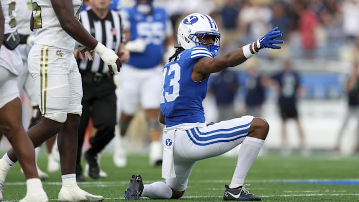 Dec 27, 2025; Orlando, FL, USA; BYU Cougars wide receiver Jojo Phillips (13) reacts after a first down against the Georgia Tech Yellow Jackets in the second quarter during the Pop-Tarts Bowl at Camping World Stadium. Mandatory Credit: Nathan Ray Seebeck-Imagn Images