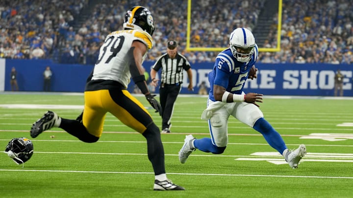 Indianapolis Colts quarterback Anthony Richardson (5) rushes the ball as Pittsburgh Steelers safety Minkah Fitzpatrick (39) closes in Sunday, Sept. 29, 2024, during a game against the Pittsburgh Steelers at Lucas Oil Stadium in Indianapolis.