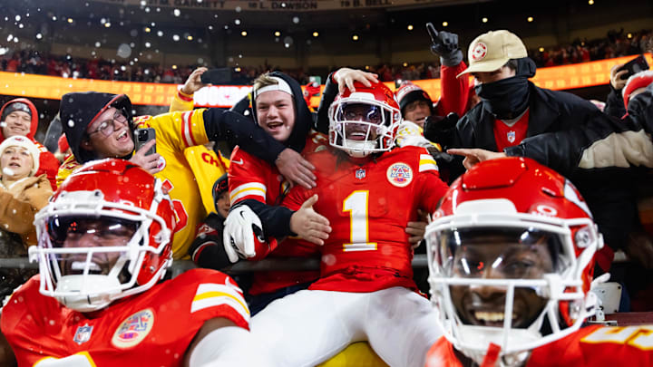 Jan 26, 2025; Kansas City, MO, USA; Kansas City Chiefs wide receiver Xavier Worthy (1) celebrate with fans after a touchdown against the Buffalo Bills during the first half in the AFC Championship game at GEHA Field at Arrowhead Stadium. Mandatory Credit: Mark J. Rebilas-Imagn Images