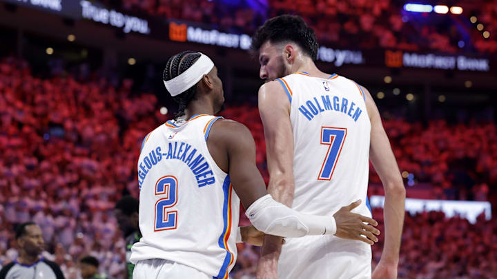 May 20, 2025; Oklahoma City, Oklahoma, USA; Oklahoma City Thunder guard Shai Gilgeous-Alexander (2) and forward Chet Holmgren (7) react after a play in the fourth quarter against the Minnesota Timberwolves during game one of the western conference finals for the 2025 NBA Playoffs at Paycom Center. Mandatory Credit: Alonzo Adams-Imagn Images May 20, 2025; Oklahoma City, Oklahoma, USA; Oklahoma City Thunder guard Shai Gilgeous-Alexander (2) and forward Chet Holmgren (7) react after a play in the fourth quarter against the Minnesota Timberwolves during game one of the western conference finals for the 2025 NBA Playoffs at Paycom Center. Mandatory Credit: Alonzo Adams-Imagn Images