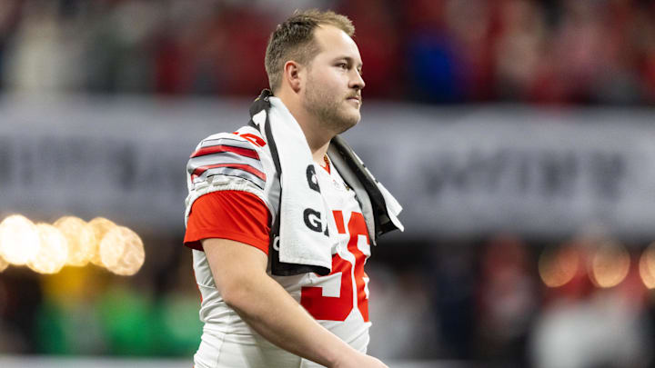 Jan 20, 2025; Atlanta, GA, USA; Ohio State Buckeyes offensive lineman Seth McLaughlin (56) against the Notre Dame Fighting Irish during the CFP National Championship college football game at Mercedes-Benz Stadium. Mandatory Credit: Mark J. Rebilas-Imagn Images