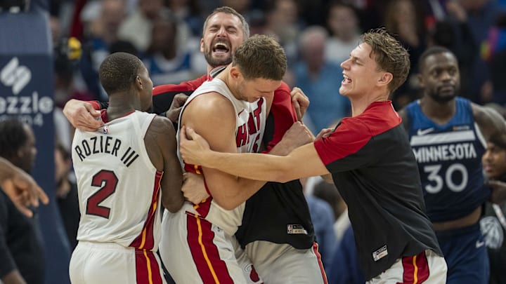 Nov 10, 2024; Minneapolis, Minnesota, USA; Miami Heat forward Nikola Jovic (5) (middle) celebrates with teammates after defeating the Minnesota Timberwolves at Target Center. Mandatory Credit: Jesse Johnson-Imagn Images Nov 10, 2024; Minneapolis, Minnesota, USA; Miami Heat forward Nikola Jovic (5) (middle) celebrates with teammates after defeating the Minnesota Timberwolves at Target Center. Mandatory Credit: Jesse Johnson-Imagn Images