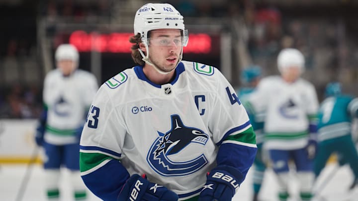 Nov 2, 2024; San Jose, California, USA; Vancouver Canucks defenseman Quinn Hughes (43) warms up on the ice before the game between the Vancouver Canucks and the San Jose Sharks at SAP Center at San Jose. Mandatory Credit: Robert Edwards-Imagn Images