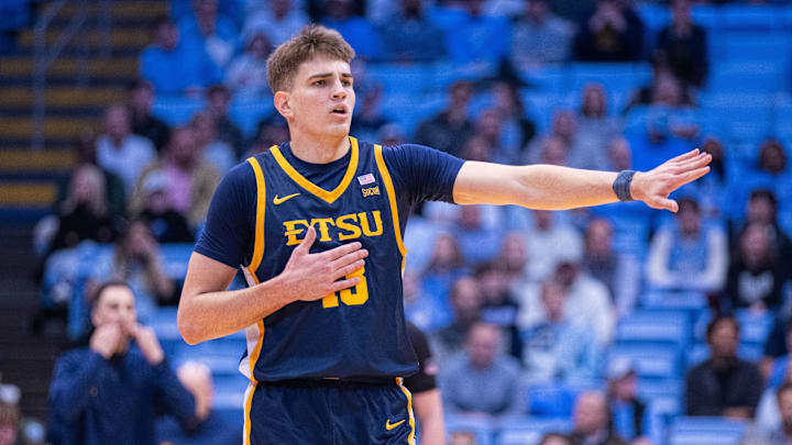 Dec 16, 2025; Chapel Hill, North Carolina, USA; ETSU Buccaneers forward Blake Barkley (13) calls out the play during the first half against the North Carolina Tar Heels at Dean E. Smith Center. Mandatory Credit: Scott Kinser-Imagn Images Dec 16, 2025; Chapel Hill, North Carolina, USA; ETSU Buccaneers forward Blake Barkley (13) calls out the play during the first half against the North Carolina Tar Heels at Dean E. Smith Center. Mandatory Credit: Scott Kinser-Imagn Images