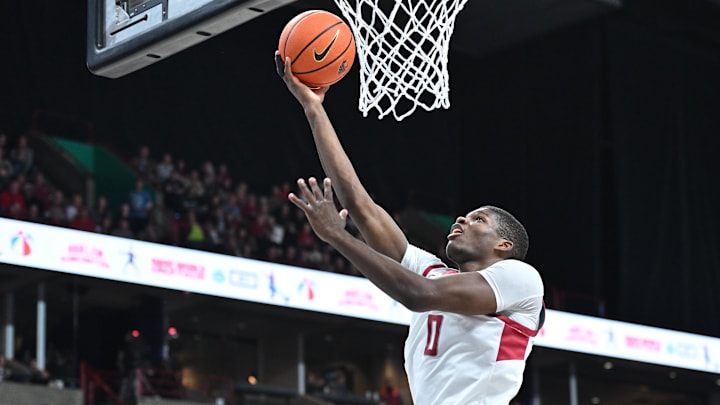 Nov 21, 2024; Spokane, Washington, USA; Washington State Cougars guard Cedric Coward (0) makes an easy lay up against the Eastern Washington Eagles in the first half at Spokane Veterans Memorial Arena. Mandatory Credit: James Snook-Imagn Images